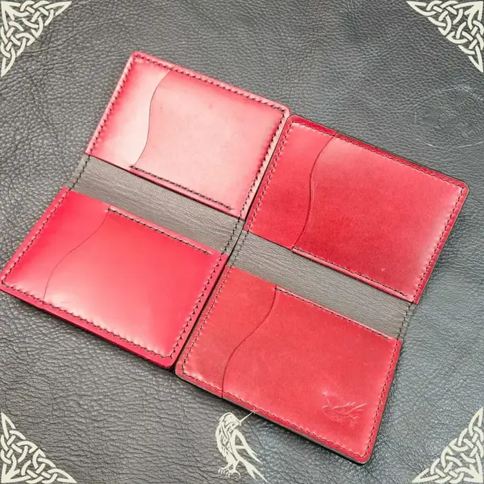 Rogue Artisan bifold wallet, raven emboss, red leather