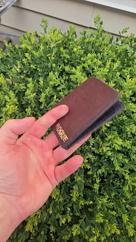 Burgundy bifold in the daylight — Rogue Artisan leather workshop, East Vancouver