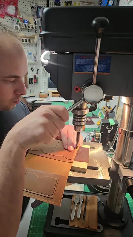 Lining up a stamp — Rogue Artisan leather workshop, East Vancouver
