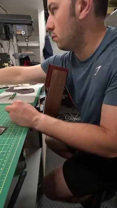 Head down, mid-build — Rogue Artisan leather workshop, East Vancouver