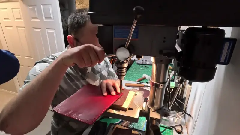 Lining up the next stamp — Rogue Artisan leather workshop, East Vancouver