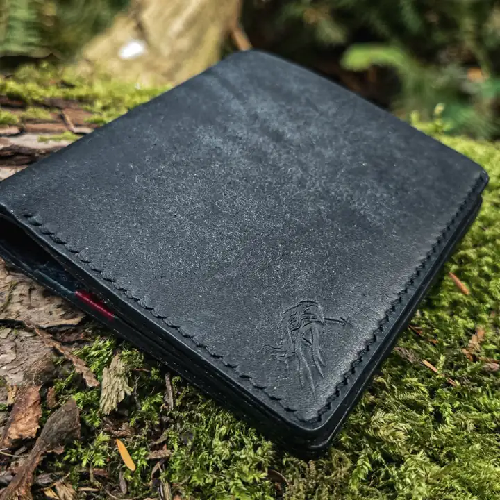 Black bifold with a red interior — Rogue Artisan, East Vancouver